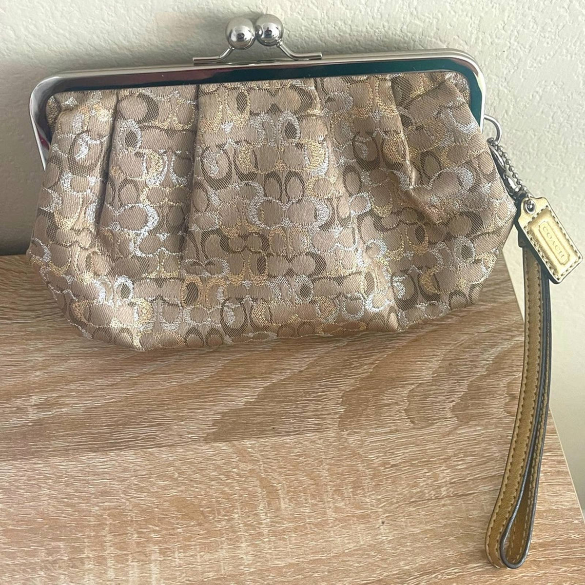 Coach signature metallic gold/silver kiss-lock clutch/wristlet